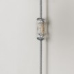 Vägglampa i metall med tvåpolig stickpropp